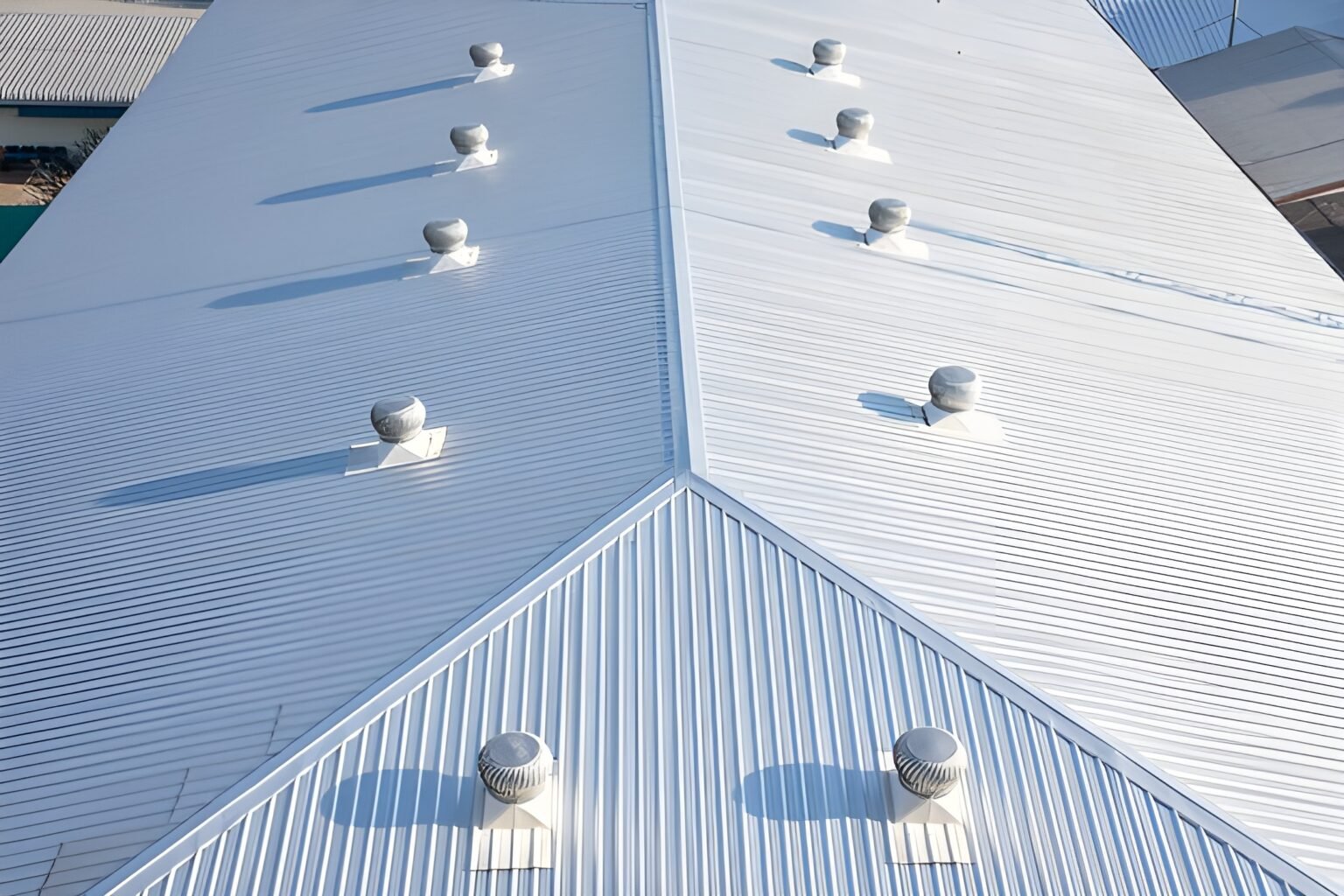 Commercial Roofing. Large white metal roof. Commercial roofer in Ridgeland